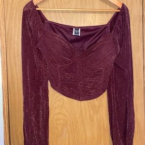 Purple sparkly crop blouse.